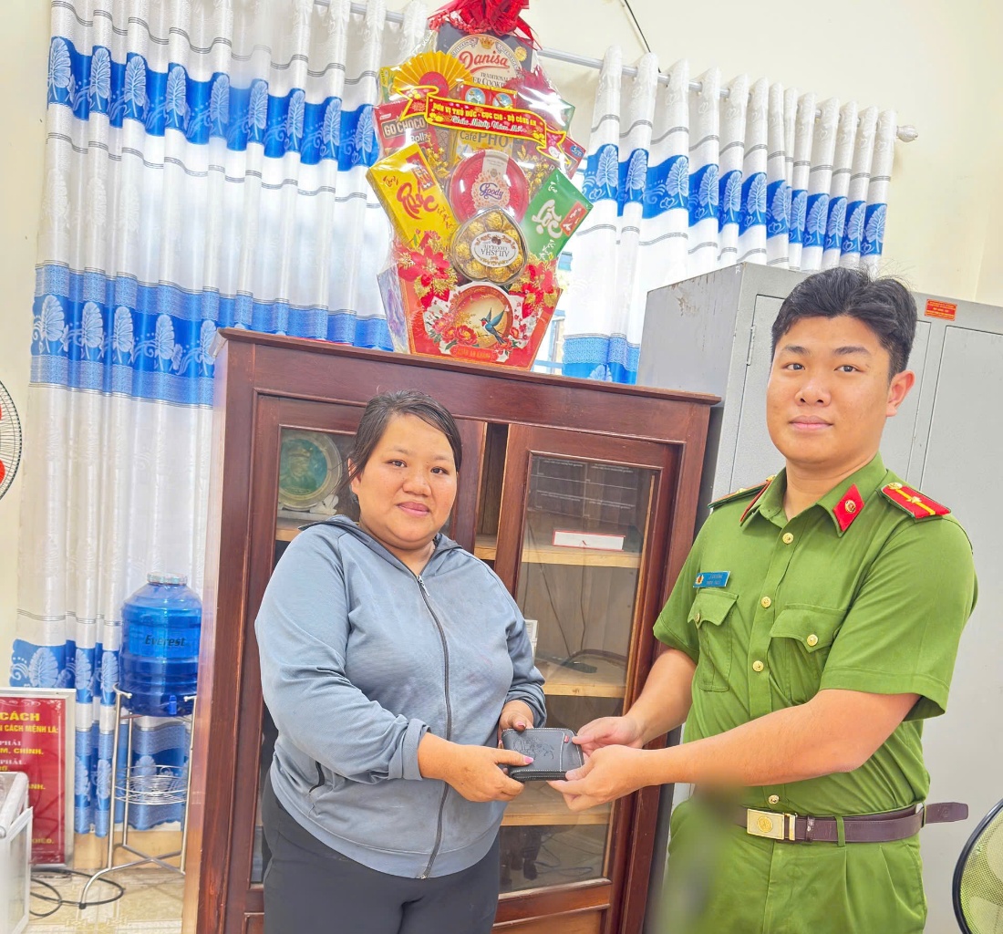 'Description: A person in uniform holding a person in front of a cabinet

AI-generated content may be incorrect.'