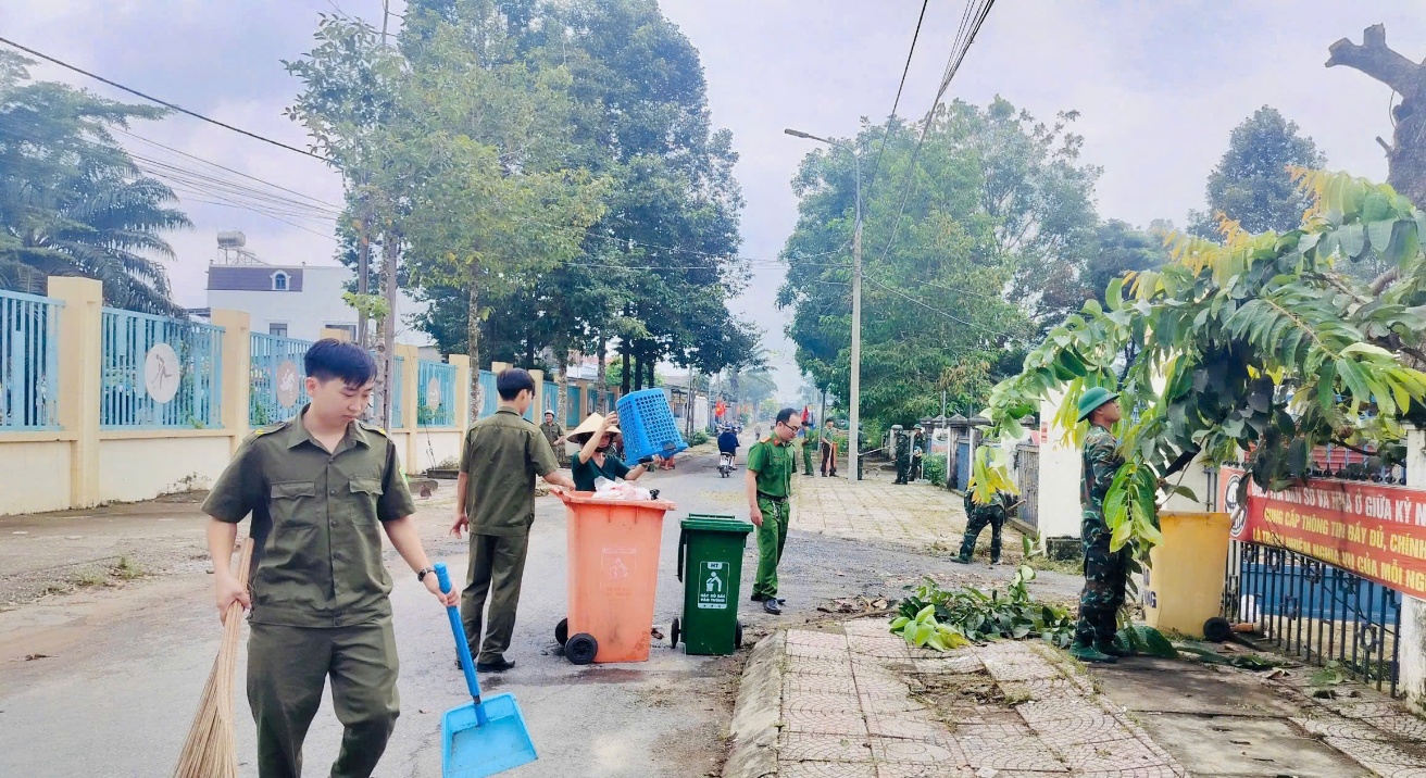''Description: A group of people cleaning the street

AI-generated content may be incorrect.''