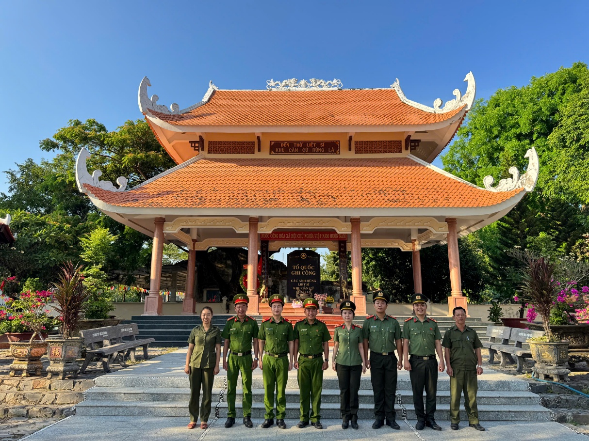 ''Description: A group of people in uniform standing in front of a building

AI-generated content may be incorrect.''